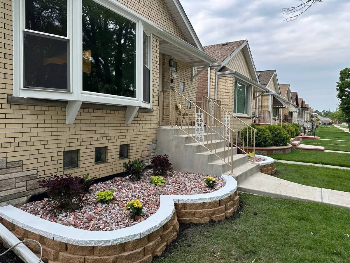 retaining wall with stone rocks and plants